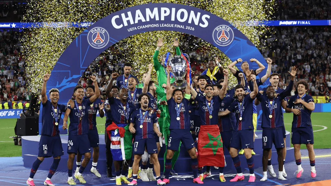 PSG players lifting the Champions League trophy for the second consecutive year