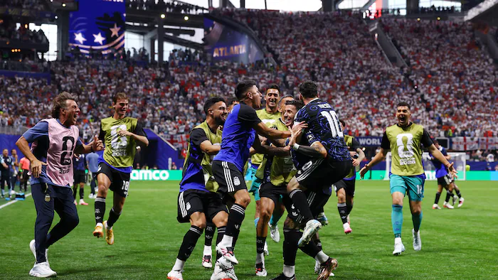 Argentina players celebrate a goal against England