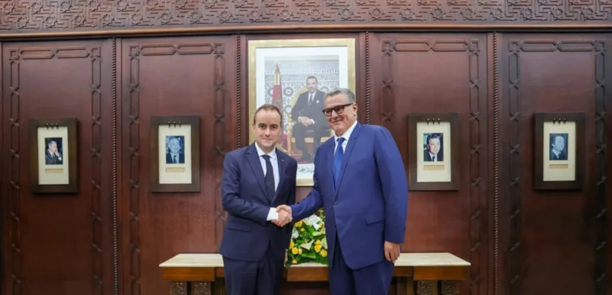 France Morocco leaders shaking hands