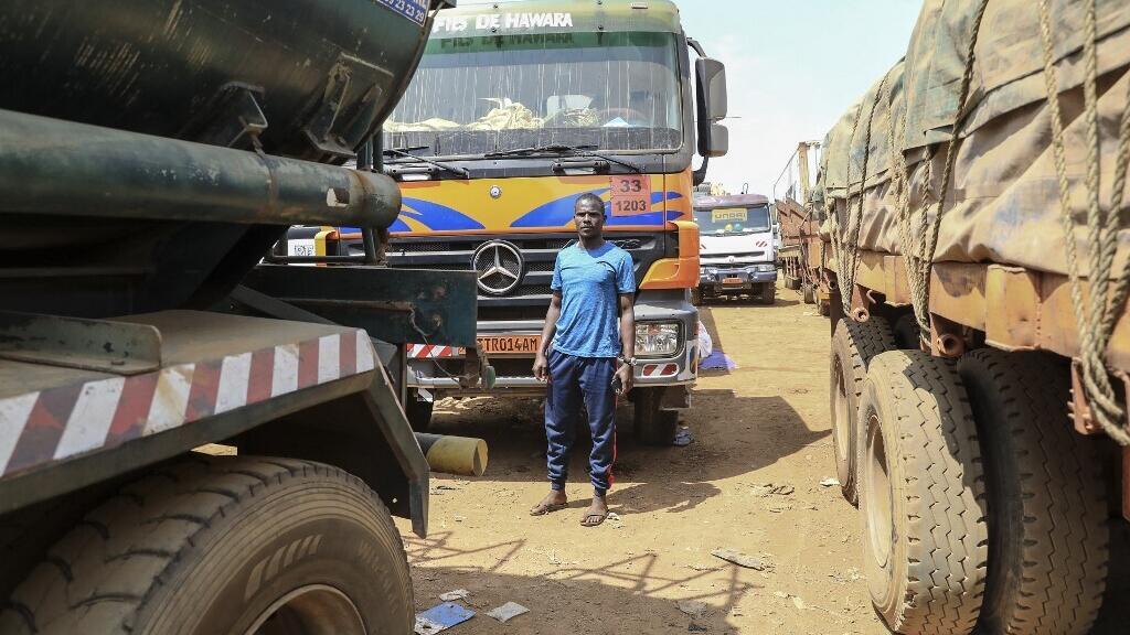 Trucks waiting on the main road linking Bangui in the Central African Republic to Douala, Cameroon (illustrative image).